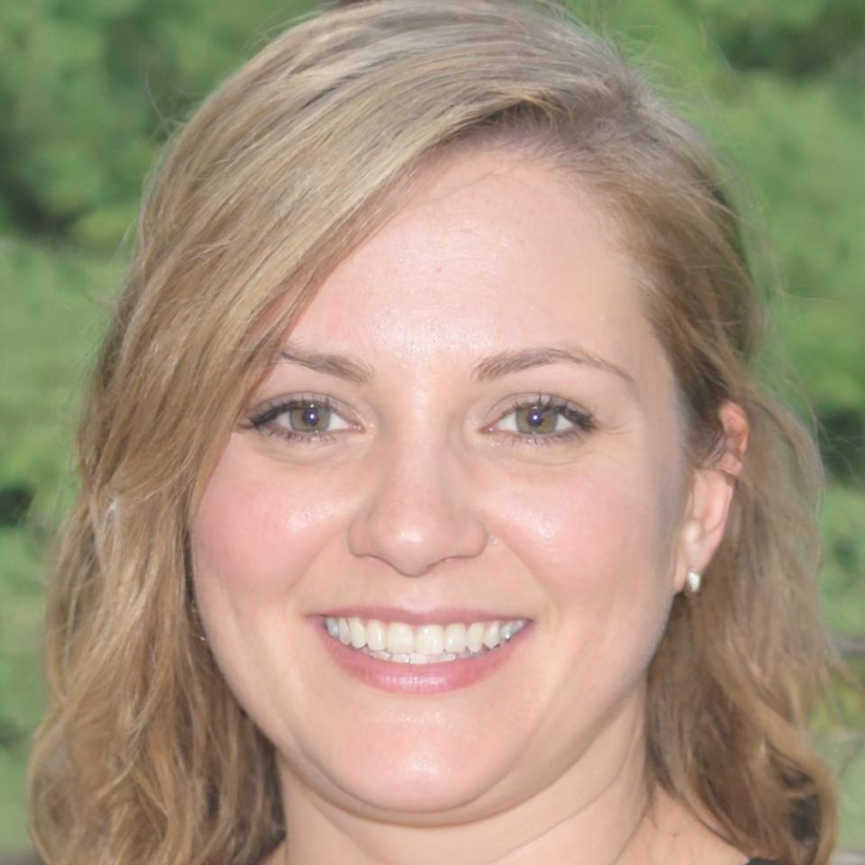 Professional headshot of experienced project manager